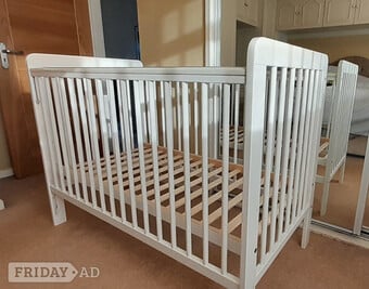 Cot. Condition good. Kept by grandparents for occasional use.