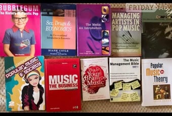 Music Industry course books like new.