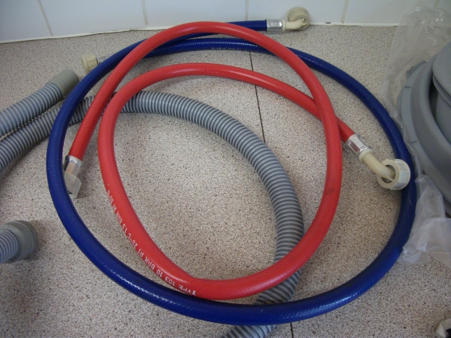 Glasgow Hotpoint Washing Machine Door Seal (C00201247), hoses, brushes.