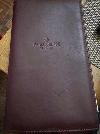 Patek Philippe wallet accessory.