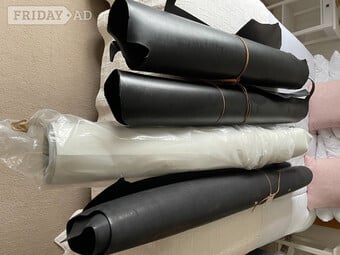 SEVERAL ROLLS OF LEATHER