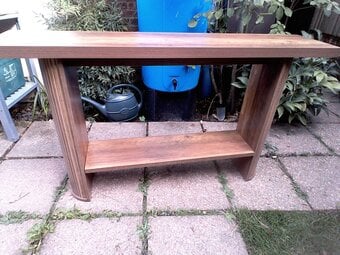 Console Table. Laminated engineered wood with shelf under. 