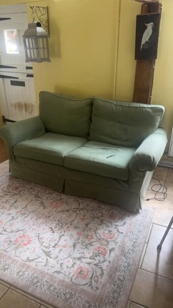 FREE TO COLLECTOR.  Duresta 2/3 seater sofa in sage green.  cost over 2k new.