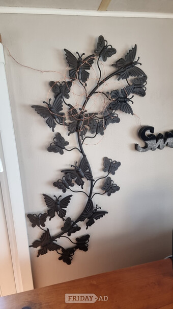 Iron wall display