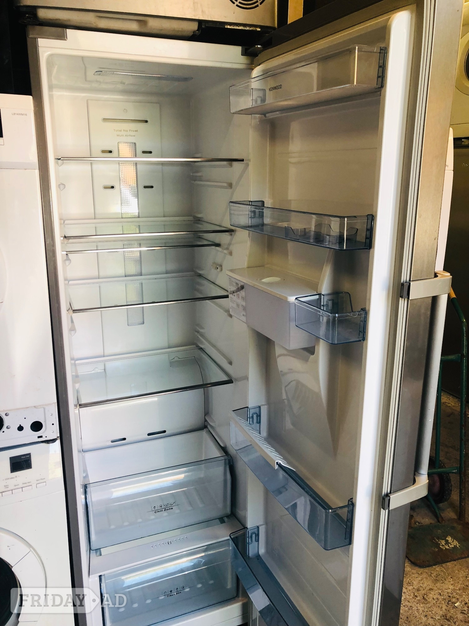 Kenwood large fridge 180cm tall with water dispenser.