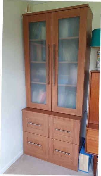 Cabinet with glass fronted cabinet doors and 4 filing drawers