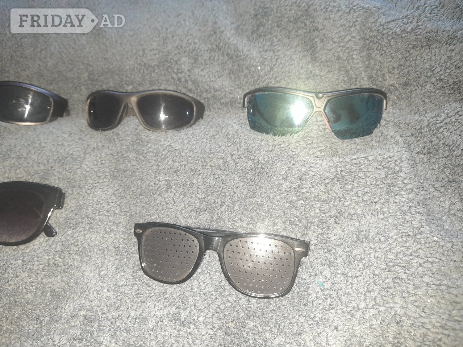 A selection of various sunglasses-job lot
