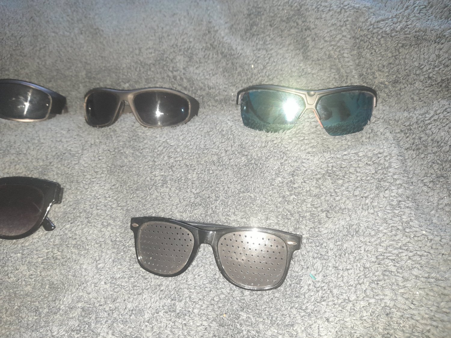 A selection of various sunglasses-job lot