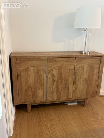 Next sideboard. 3 arched doors. Oak effect. H 75 x w 115.5 x D 30