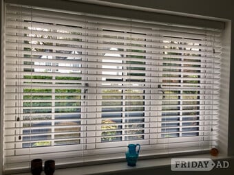 Wooden, white venetian blinds 