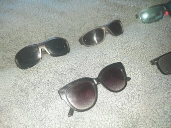 A selection of various sunglasses-job lot