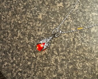 New metallic claw with red ball pendant & chain