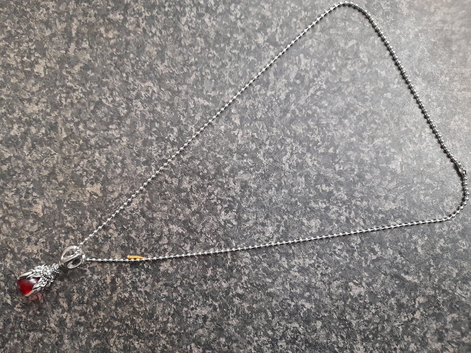 New metallic claw with red ball pendant & chain