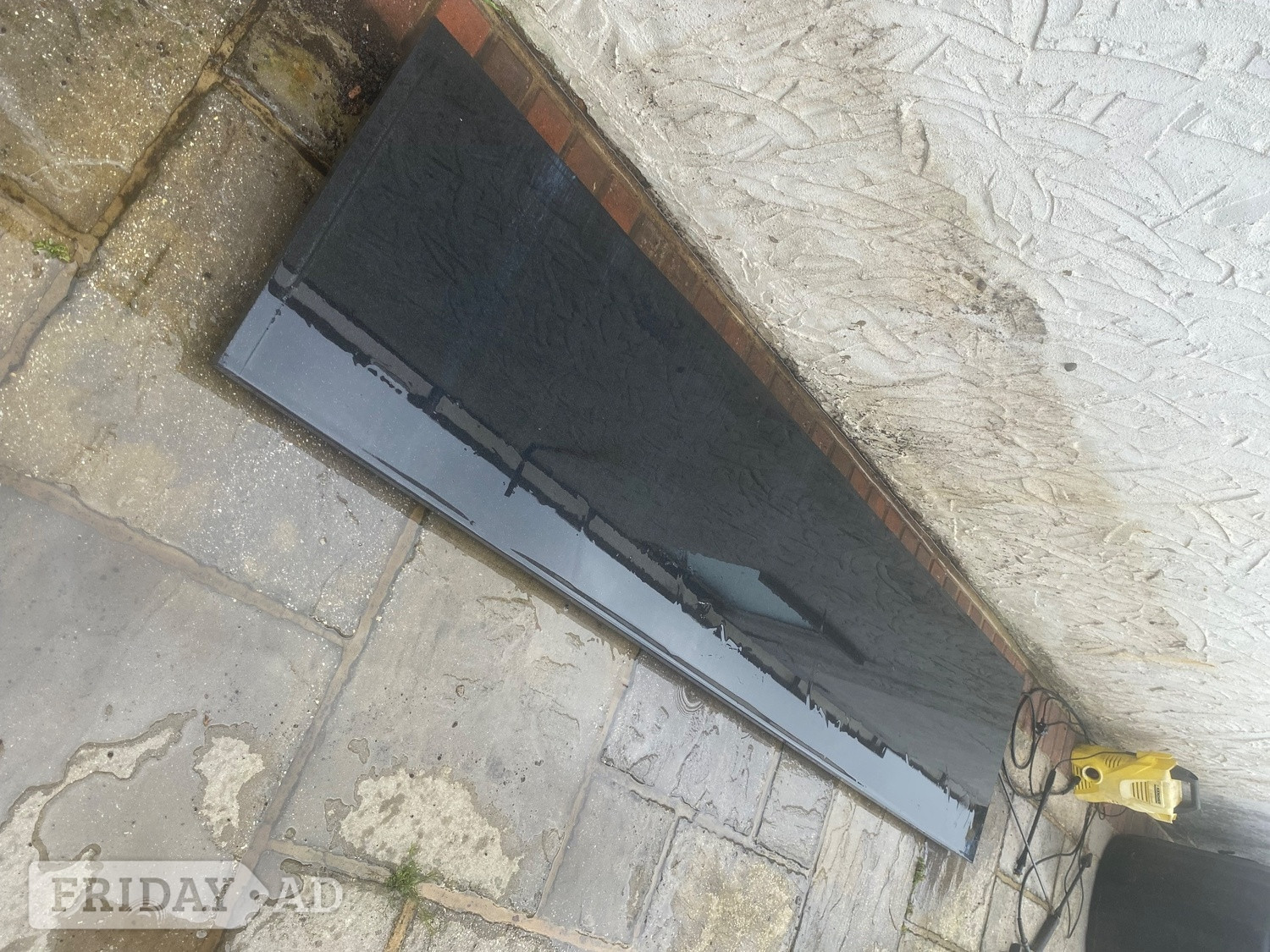 Black solid granite worktop in Shoreham-By-Sea