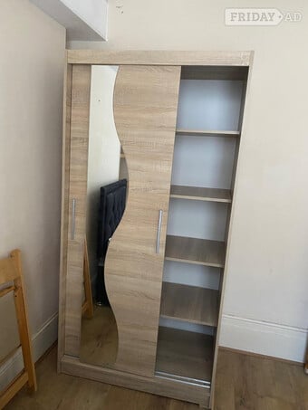 Wardrobe as good as new. 