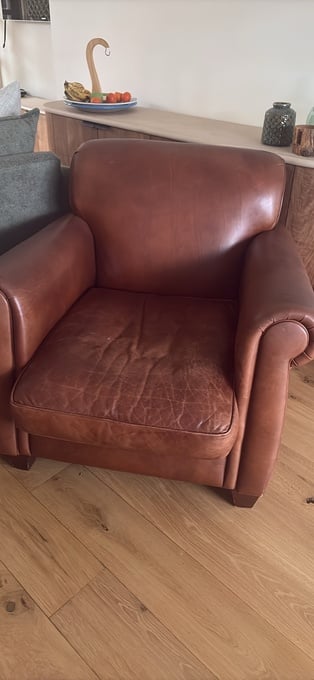 Brown leather armchair