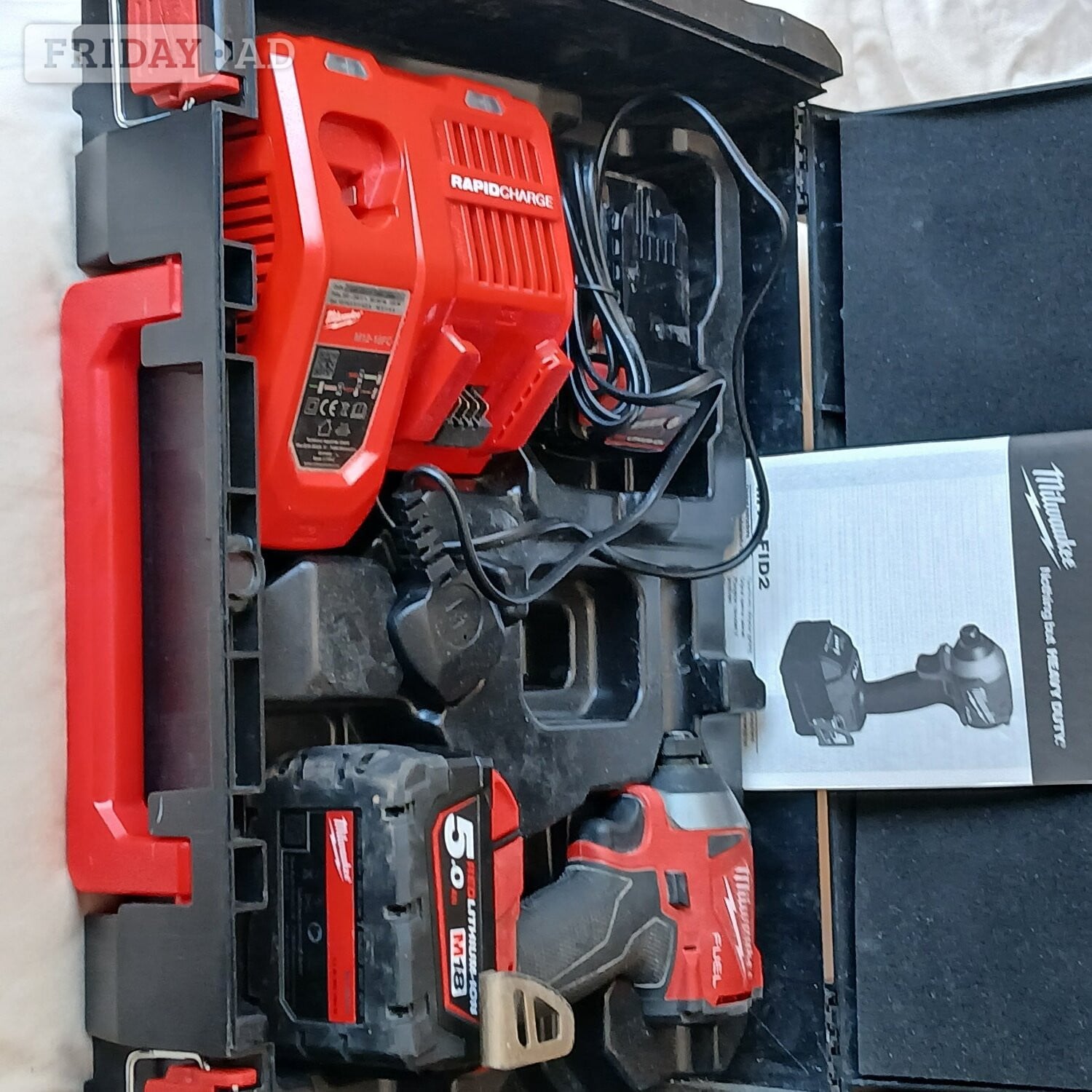 Brand new milwaukie fuel impact driver  with 2 number  5.0 ah bat