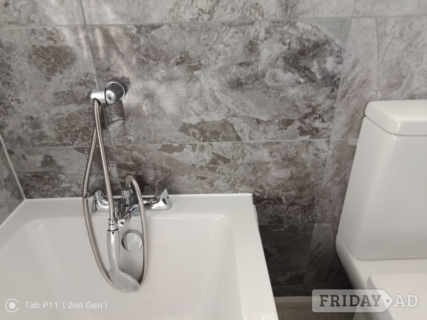 Modern wall tiles.   Rivona grey.   in Eastbourne
