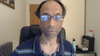 Male Masseur Offering Massage