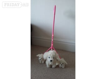 Animagic dog and pups attached on a lead good condition.