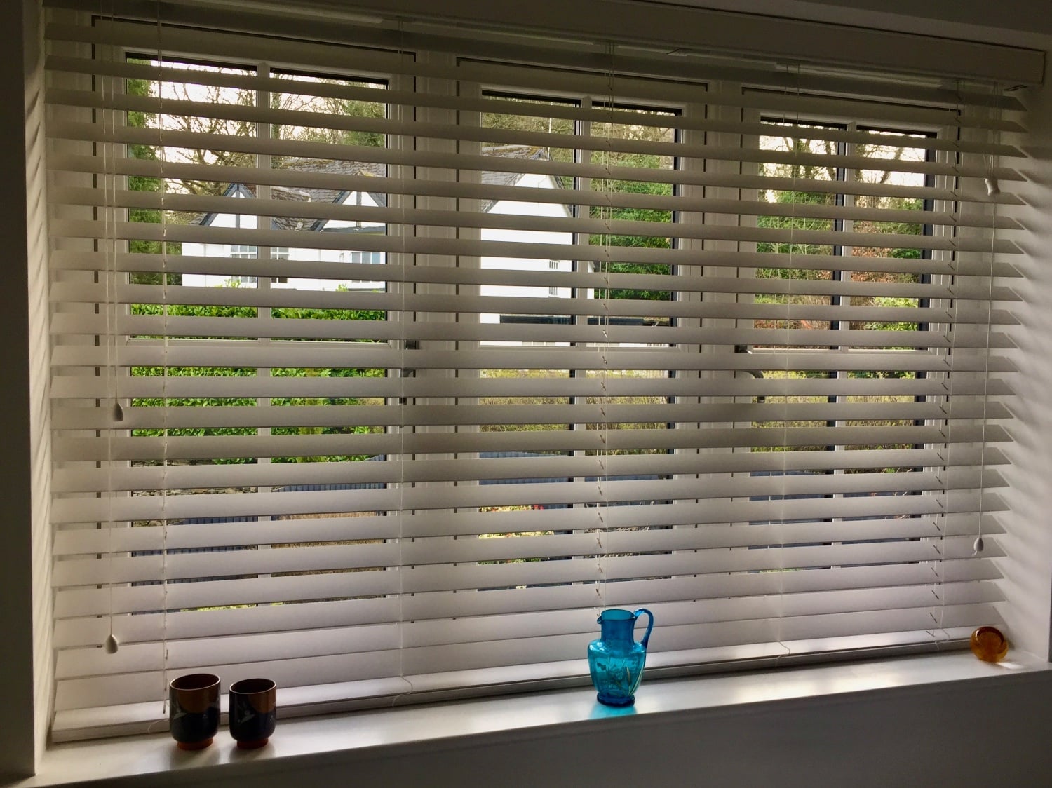 Wooden, white venetian blinds 