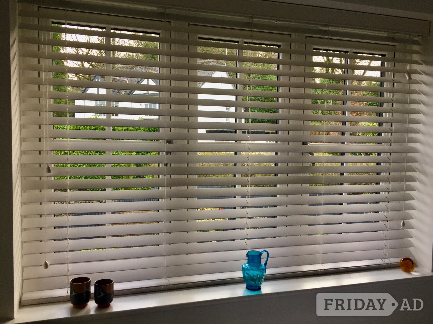 Wooden, white venetian blinds 