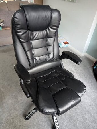 Comfy padded office swivel chair with tilt and height adjustment