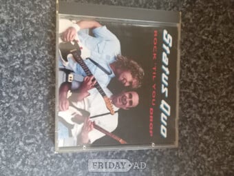 "ROCK 'TIL YOU DROP " STATUS QUO CD  (SIGNED COPY)
