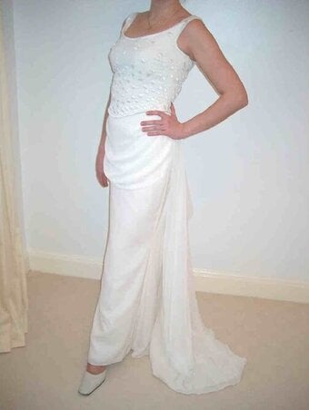 WEDDING DRESS by the world renowned brand & specialist wedding dress makers “Pronovias Collection”. 