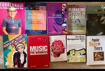 Music Industry course books like new.