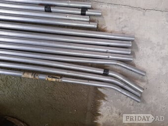Collection of tent poles and accessories 